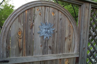Gate with sun attached